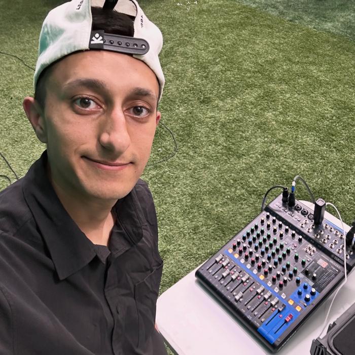 Josh running sound at an outreach