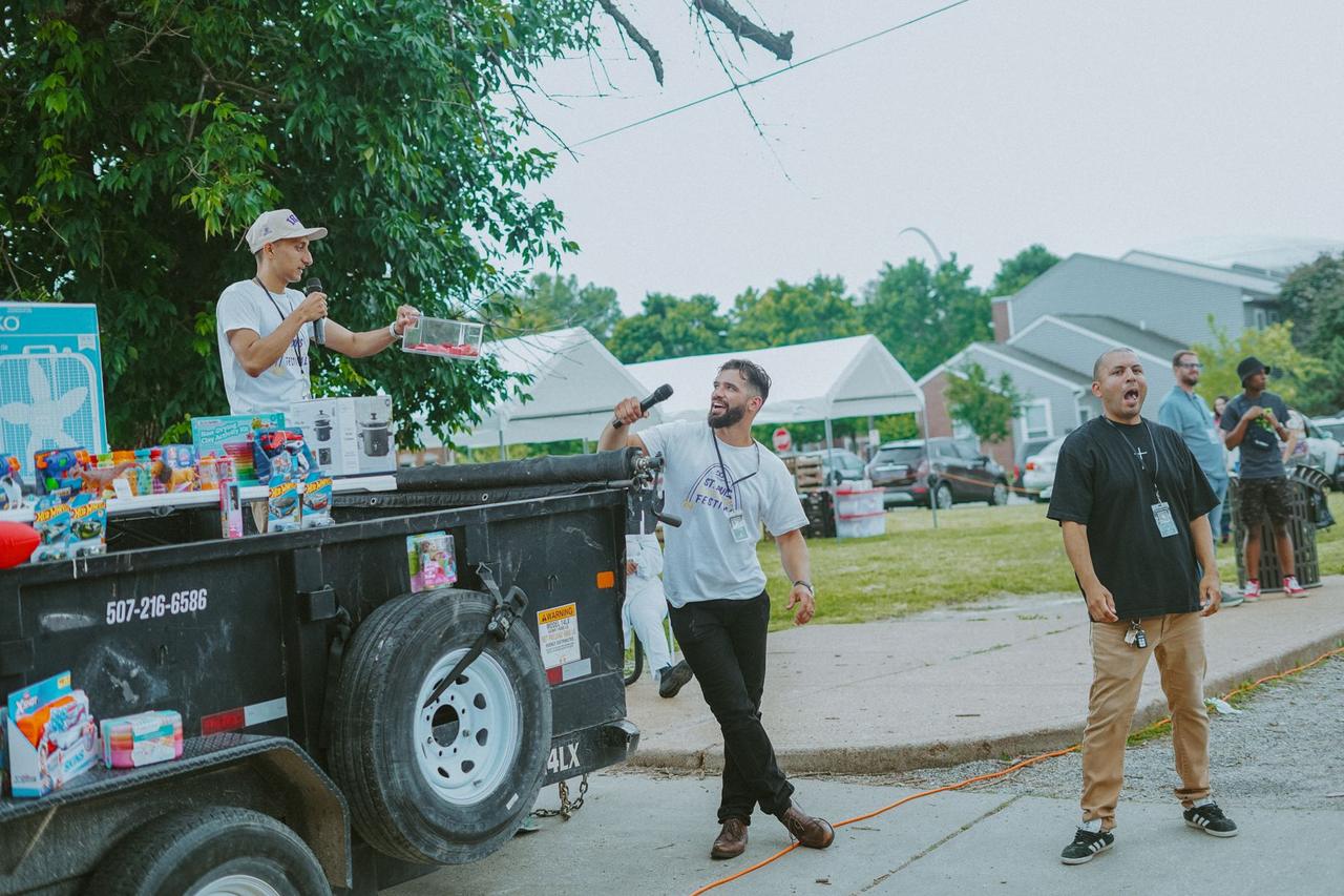 A trailer used as a stage with the MC leading the crowd