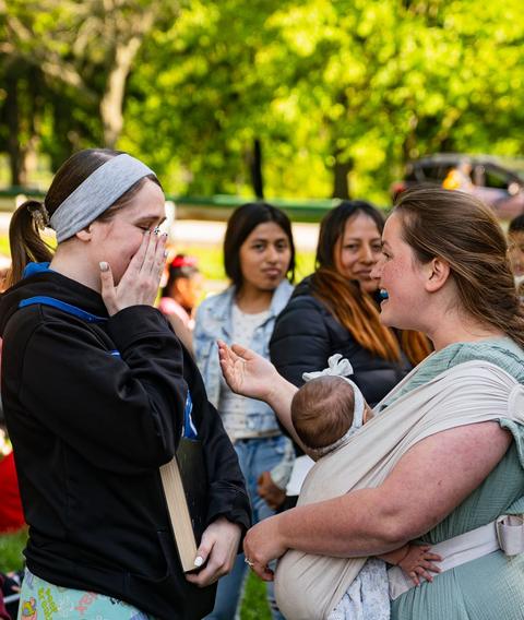 Moms and kids enjoying an outreach