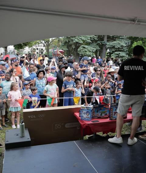 A tent stage set up for an outreach