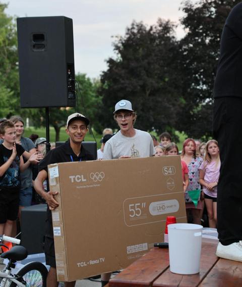 A television being given away at an outreach